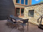 Common Area Deck with hot tub, grills, seating and tables, and 2 fire features
